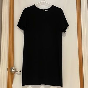 Black, silky Babaton dress